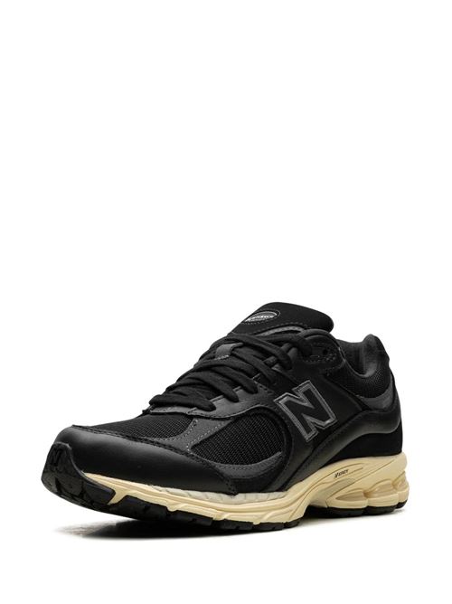 Black/white leather mesh sneaker New Balance | M2002RIBBLACK